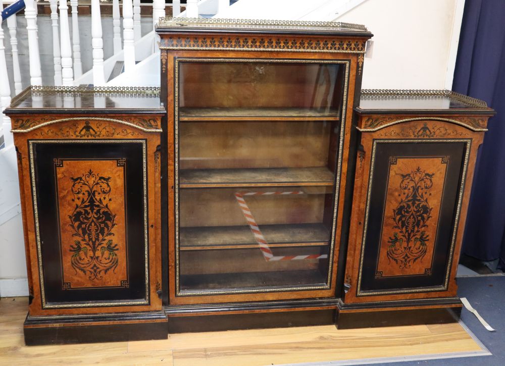 A Victorian ebonised and amboyna side cabinet with brass mounts, W.200cm, D.38cm, H.136cm